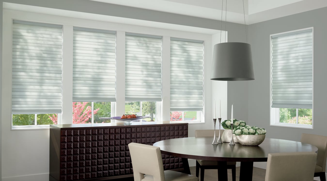 Cordless motorized shades in a Dover dining room